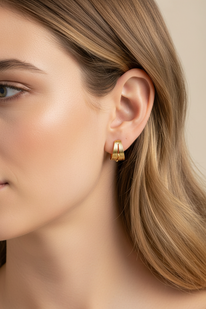 Golden Wave Earrings - close-up detail shot